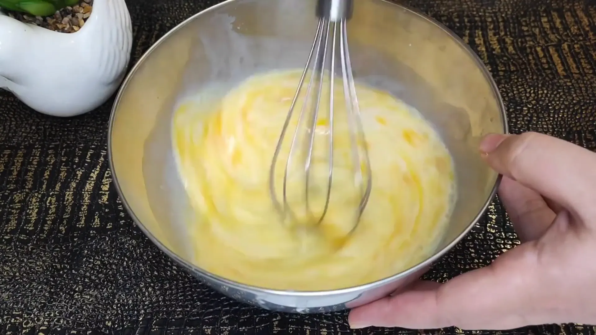 Covering the pan to cook